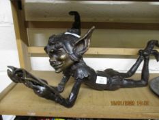 BRONZE MODEL OF AN ELF READING A BOOK