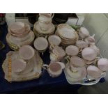 QUANTITY OF TUSCAN PUCE AND FLORAL DECORATED TEA WARES