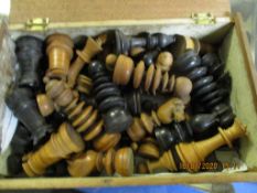 BOX OF TREEN CHESS PIECES