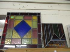 GROUP OF FOUR STAINED GLASS PANELS