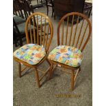 PAIR OF BEECHWOOD HARD SEATED STICK BACK KITCHEN CHAIRS (2)