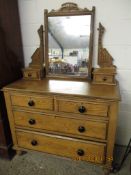 PINE DRESSING CHEST WITH SHAPED MIRROR, THE BASE FITTED WITH TWO DRAWERS OVER TWO FULL WIDTH DRAWERS