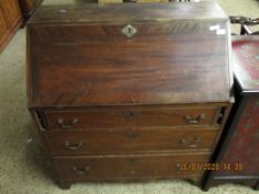 19TH CENTURY MAHOGANY DROP FRONTED BUREAU WITH THREE FULL WIDTH DRAWERS ON BRACKET FEET