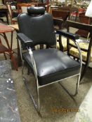 BLACK REXINE CHROMIUM ARMCHAIR WITH ADJUSTABLE HEAD REST