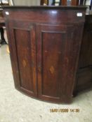 18TH CENTURY OAK BOW FRONTED CORNER CUPBOARD WITH SHELL INLAY TO DOORS