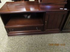 REPRODUCTION MAHOGANY TV CABINET WITH OPEN SHELF AND DROP FRONTED CUPBOARD DOOR BESIDE A PANELLED