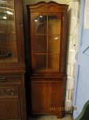 REPRODUCTION YEW WOOD FLOOR STANDING CORNER CUPBOARD WITH SINGLE GLAZED DOOR OVER PANELLED