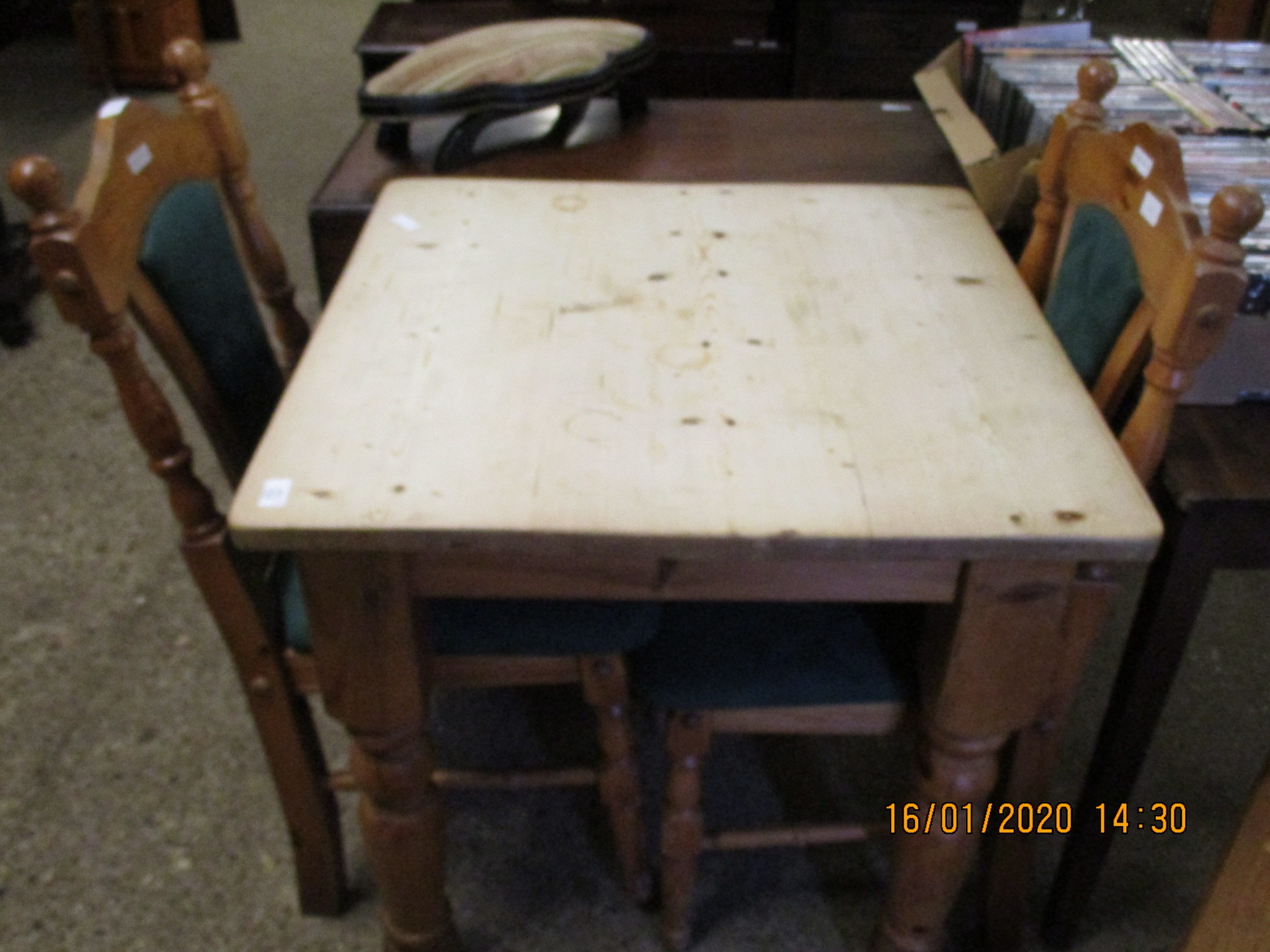 PINE FRAMED SQUARE TOP KITCHEN TABLE ON TURNED LEGS AND TWO ASSOCIATED KITCHEN CHAIRS WITH GREEN