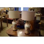 PAIR OF GOOD QUALITY MODERN FLORAL SIDE LAMPS WITH CREAM SHADES