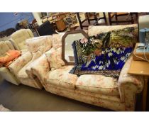 CREAM FLORAL UPHOLSTERED TWO PIECE SUITE COMPRISING A TWO SEATER SOFA AND SINGLE ARMCHAIR