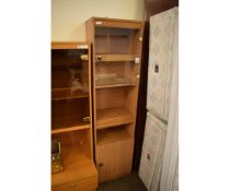 MELAMINE NARROW CABINET WITH OPEN SHELF, SINGLE GLAZED DOOR OVER PANELLED CUPBOARD DOOR