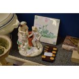 STAFFORDSHIRE FIGURE OF A WATER CARRIER, A FURTHER TREEN BRIDGE COUNTER AND A DELFT TILE
