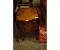 MODERN WALNUT SIDE TABLE WITH TWO DROP LEAVES AND THREE SHAPED DRAWERS RAISED ON PAD FEET