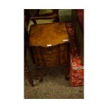 MODERN WALNUT SIDE TABLE WITH TWO DROP LEAVES AND THREE SHAPED DRAWERS RAISED ON PAD FEET