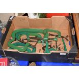 BOX CONTAINING GREEN PAINTED RECORD G-CLAMPS OF VARYING SIZES
