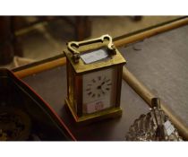 BRASS FOUR-GLASS CARRIAGE CLOCK BEARING INSCRIPTION “PRESENTED TO BRIAN GORT, GENERAL MANAGER OF B C