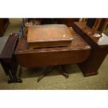 19TH CENTURY MAHOGANY PEDESTAL PEMBROKE TABLE ON A SPLAYED QUATREFOIL BASE