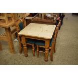 PINE SQUARE TOP KITCHEN TABLE ON TURNED LEGS WITH TWO ASSOCIATED KITCHEN CHAIRS WITH GREEN