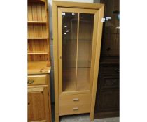 BEECHWOOD EFFECT SINGLE GLAZED DOOR BOOKCASE WITH DISPLAY CABINET WITH TWO DRAWERS TO BASE