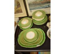 QUANTITY OF ASHWORTH BROS GREEN AND GILDED RIM PART DINNER WARES