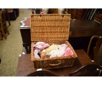 WICKER BASKET CONTAINING MIXED DOLLS, CLOTHING ETC