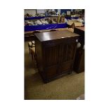 OLD CHARM OAK FRAMED LINEN FOLD FRONTED TV CABINET