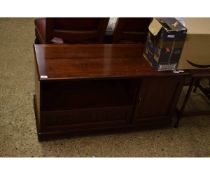 REPRODUCTION MAHOGANY TV CABINET WITH OPEN SHELF AND DROP FRONTED CUPBOARD DOOR BESIDE A PANELLED