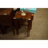 NEST OF TWO MAHOGANY TABLES WITH SHAPED FRONTS