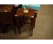 NEST OF TWO MAHOGANY TABLES WITH SHAPED FRONTS