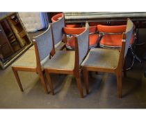 SET OF FOUR TEAK FRAMED DINING CHAIRS WITH CREAM UPHOLSTERY