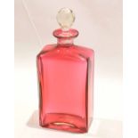 Ruby coloured glass decanter with faceted stopper, 25cm high