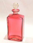 Ruby coloured glass decanter with faceted stopper, 25cm high