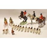 Beswick hunting group comprising two male hunstmen, one on rearing horse, further lady, two children