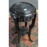 Ebonised Anglo-Indian or Oriental two-tier torchere stand or planter of circular form with pierced