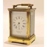 Miniature brass carriage clock, retailer's name Drummond & Co of Melbourne, 8cm high