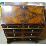 18th century style walnut bureau, fall front and fitted interior and five drawers below on bracket