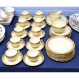 Quantity of Grosvenor china with a gilt design within gilt borders including ten cups, saucers, side