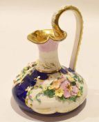 Mid-20th century Derby porcelain ewer with flower encrusted decoration within gilt panels, factory