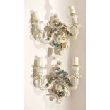 Pair of mid-20th century Continental porcelain wall lights with flower encrusted decoration and