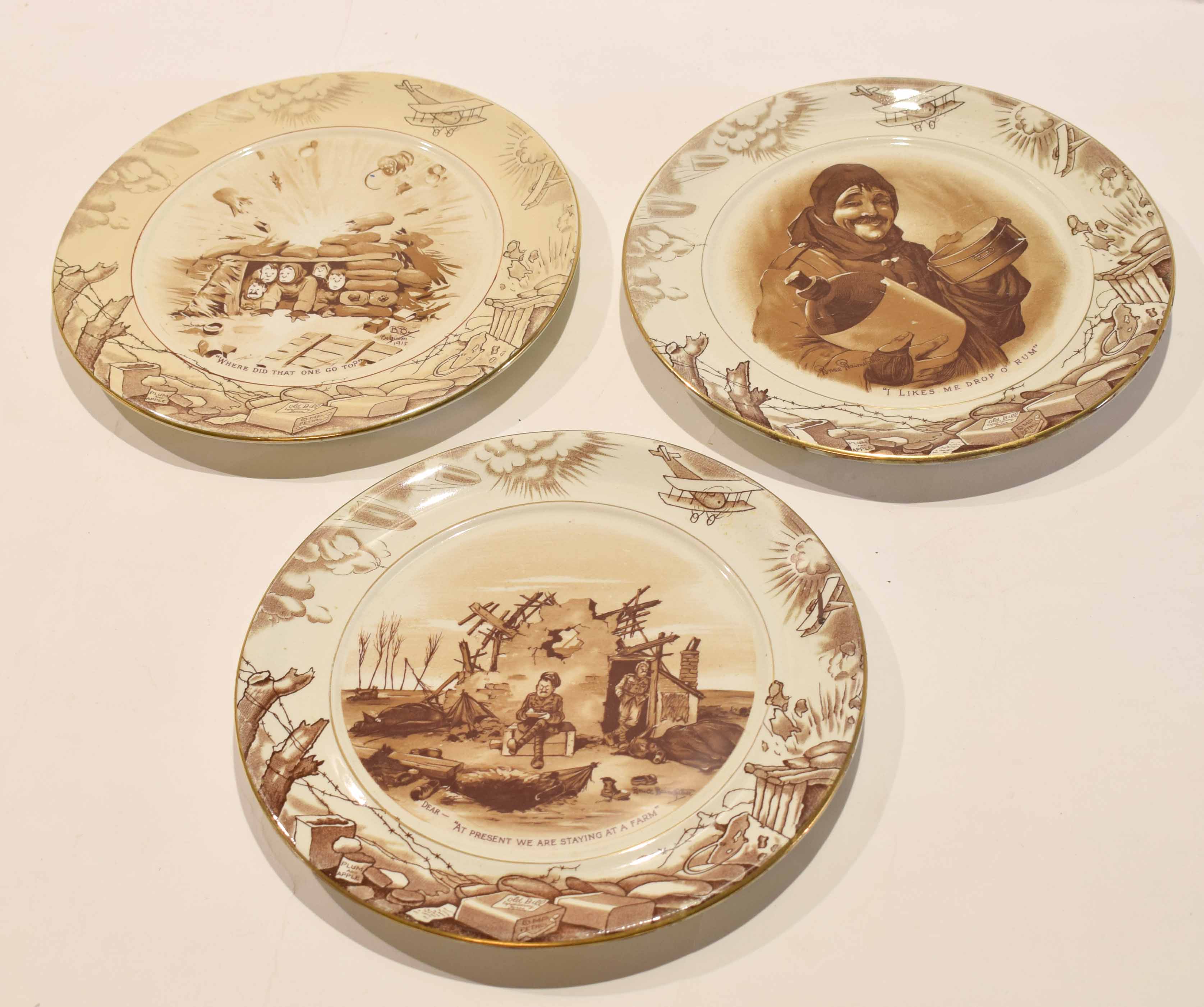 Group of three Grimwades Pottery plates all decorated with WWI designs after Bruce Bairnsfather (3)