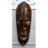 Large wooden African carving of a warrior in Benin style, 70cm long