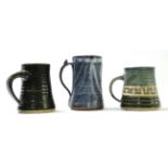 Ladi Kwali (circa 1925-1984), pottery tankard with impressed monogram for Ladi Kwali in blue