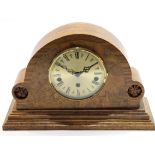 Modern mantel clock in shaped figured walnut case, 33cm long