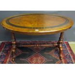 Victorian mahogany aesthetic style oval centre table raised on wrythen supports joined by a