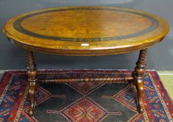 Victorian mahogany aesthetic style oval centre table raised on wrythen supports joined by a