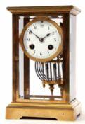 Late 19th century French lacquered band brass four-glass mantel clock, the plinth shaped case with