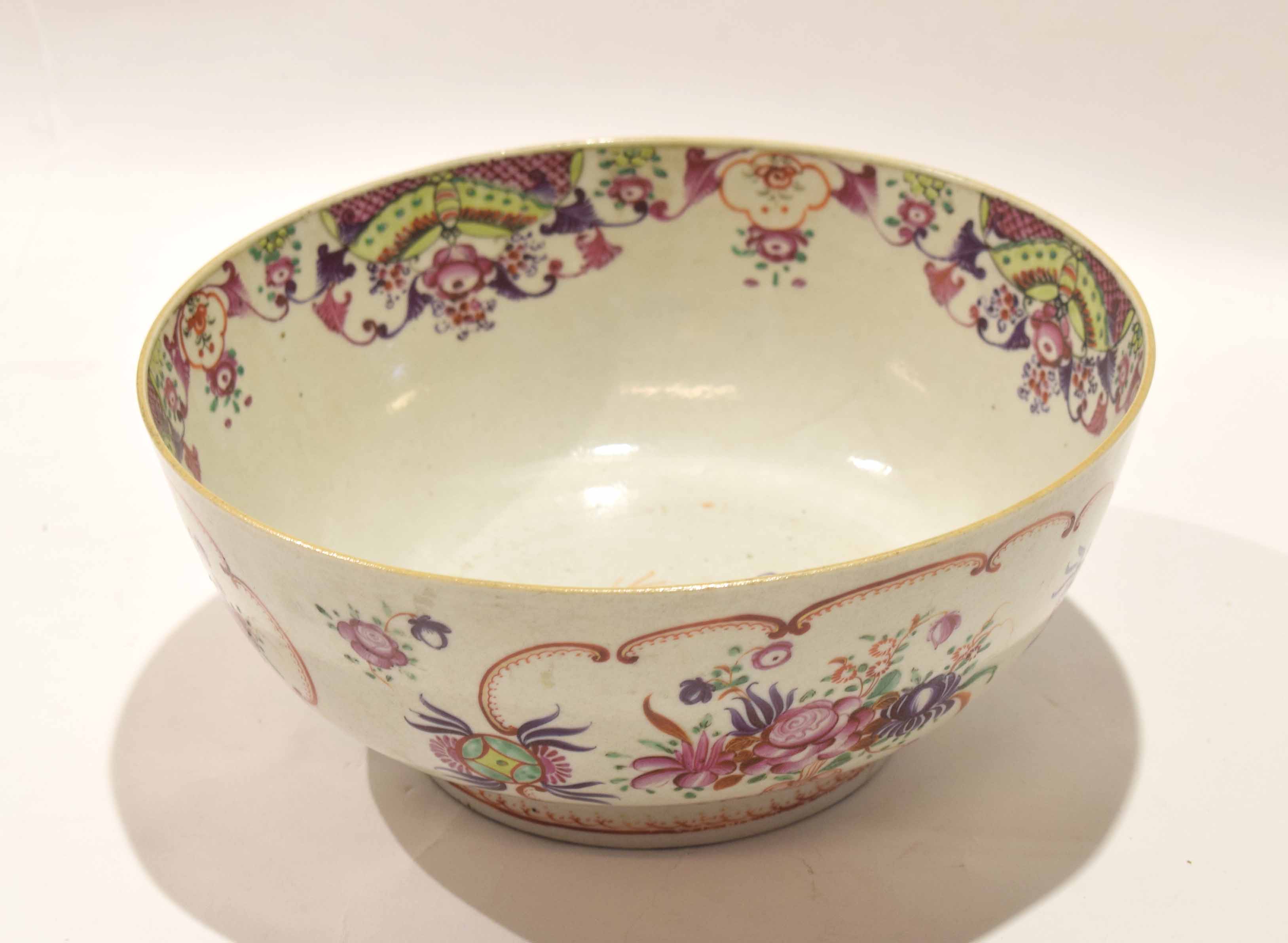 Late 18th century Chinese porcelain punch bowl, decorated in polychrome flowers to the exterior