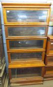 Early 20th century oak cased Globe Wernicke sectional bookcase fitted with four standard sections on