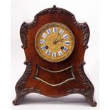 Early/mid-19th century mahogany clock case of waisted and domed rectangular design with later
