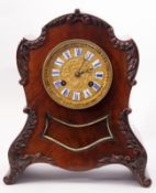 Early/mid-19th century mahogany clock case of waisted and domed rectangular design with later